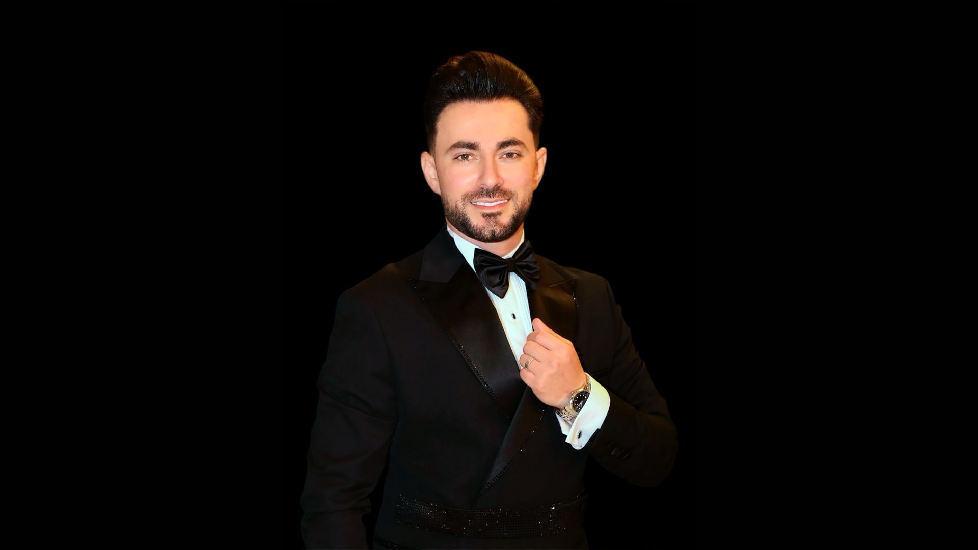 Bil Baz in a black tuxedo